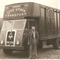 A young George Johnson with Livestock Vehicle